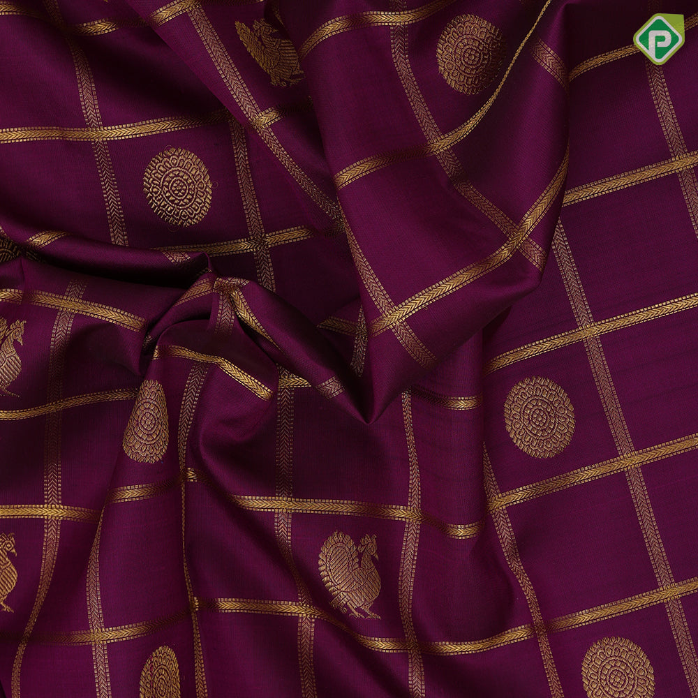 Magenta purple gold zari checks window panel butta design self gold zari peacock butta lines mid gap border traditional silk saree