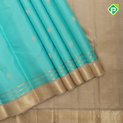 Rexona green Dull gold zari diamond butta design beige gold zari edge border traditional silk saree