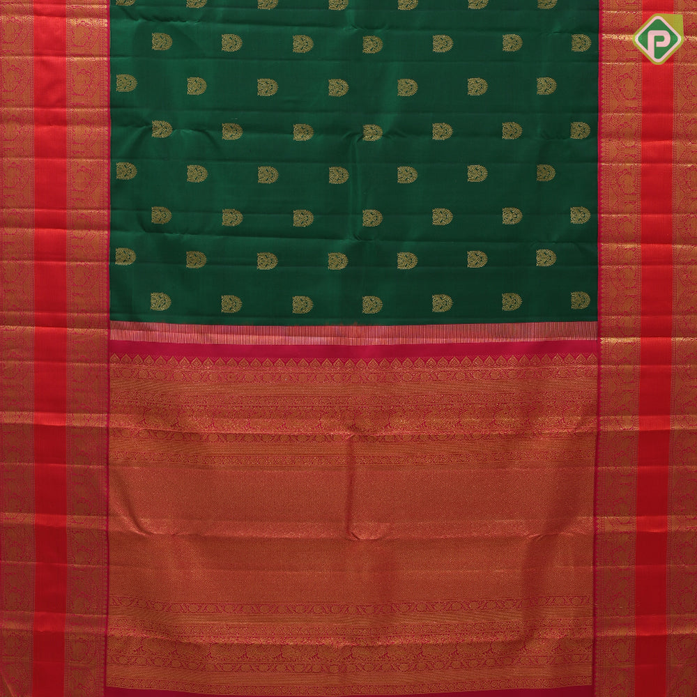 Bottle green gold zari arch and double peacock butta red gold zari elephant and arch retta pett border silk saree