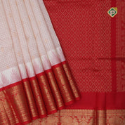 White red micro checks and kamalam butta grand pallu design red gold zari border silk cotton saree