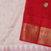 White red micro checks and kamalam butta grand pallu design red gold zari border silk cotton saree