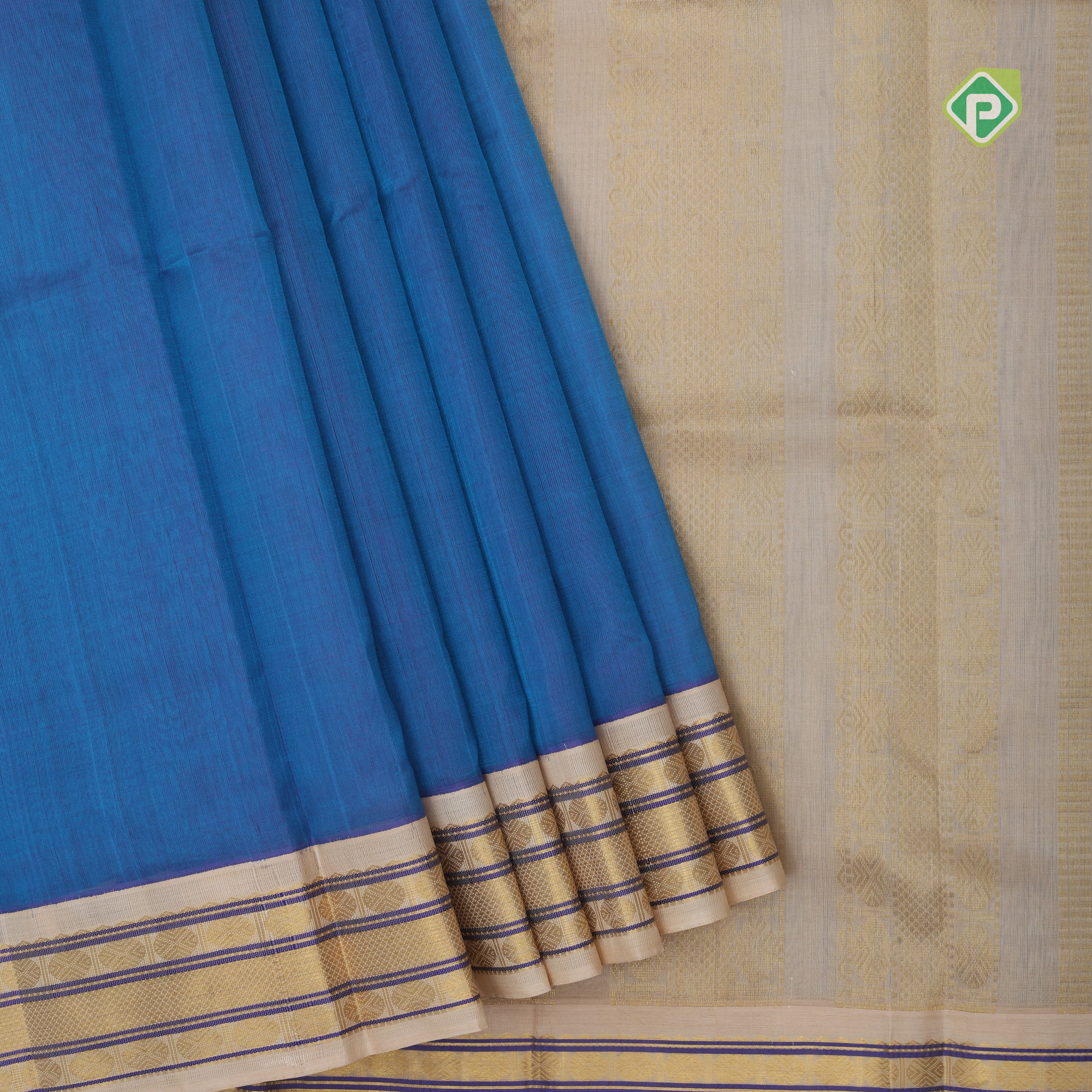 Peacock blue plain contrast red grand pallu concept cream white gold zari thread lines silk cotton saree