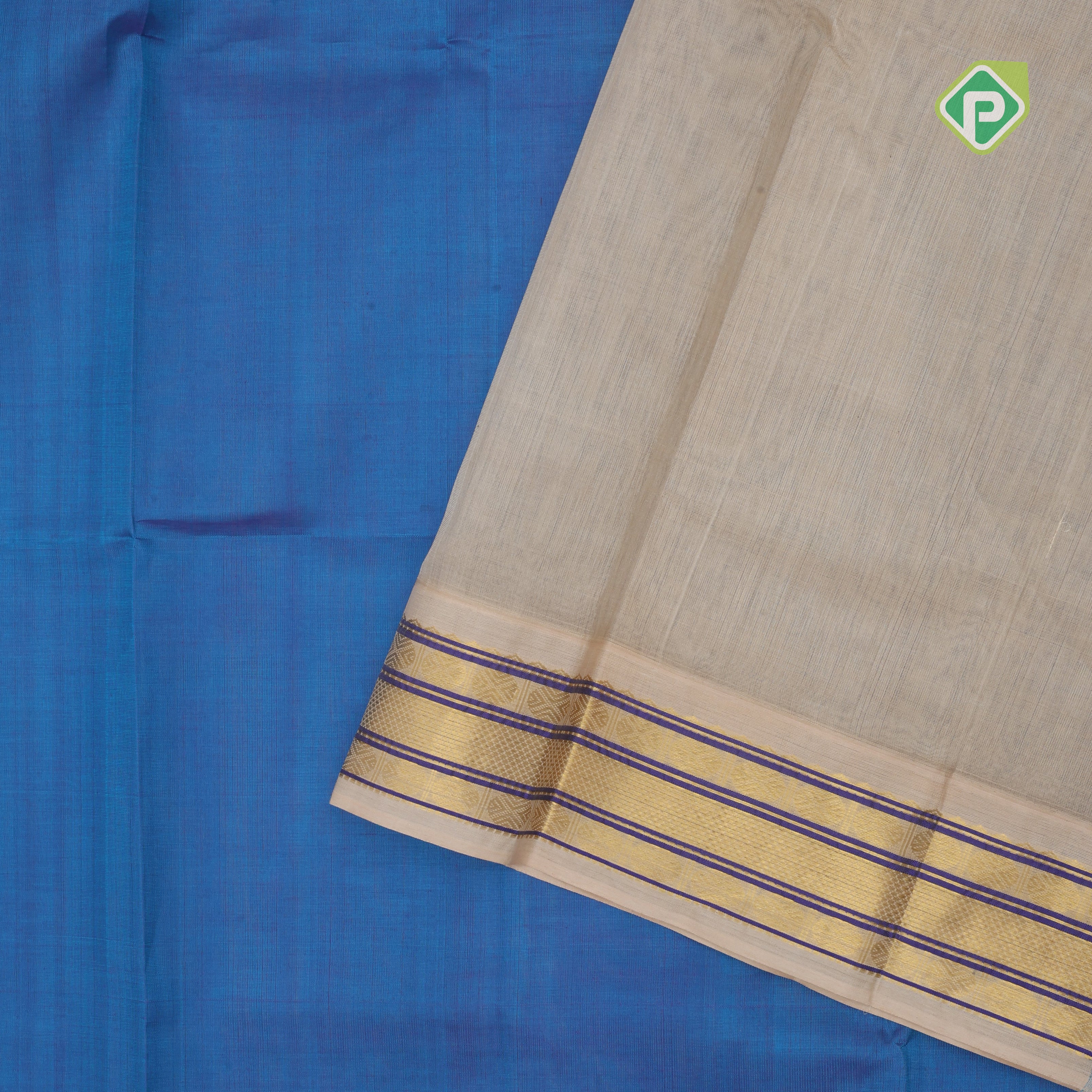 Peacock blue plain contrast red grand pallu concept cream white gold zari thread lines silk cotton saree