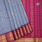 Grey gold zari fancy flower butta rich pallu design Rani pink gold zari border silk cotton saree