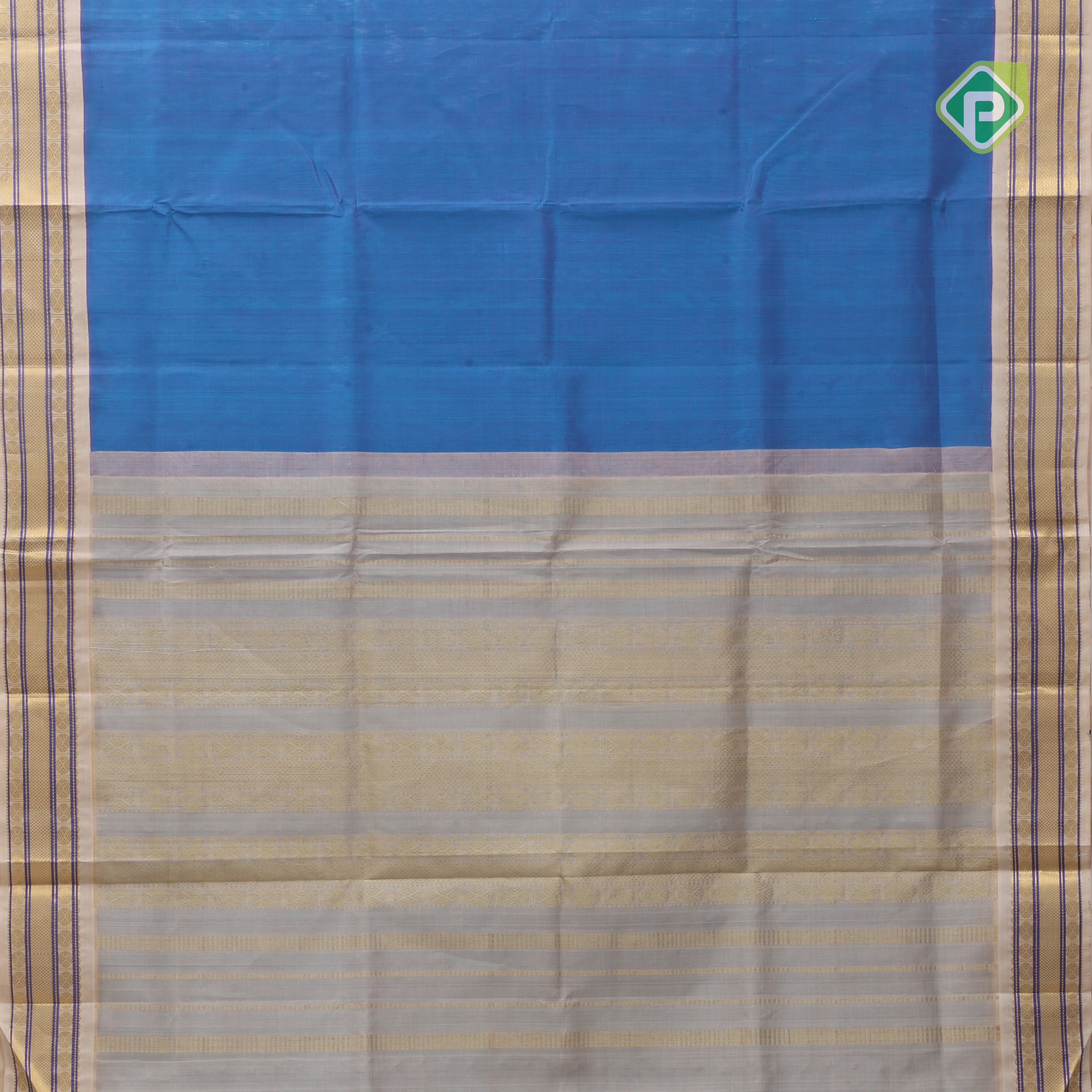 Peacock blue plain contrast red grand pallu concept cream white gold zari thread lines silk cotton saree