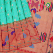 peacock green gold zari double check flower butta red gold zari pythonic border banaras style silk saree