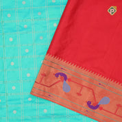 peacock green gold zari double check flower butta red gold zari pythonic border banaras style silk saree