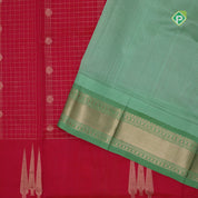 Hot Pink dull gold zari checks and butta lines contrast leaf green gold zari mailkan border silk cotton saree