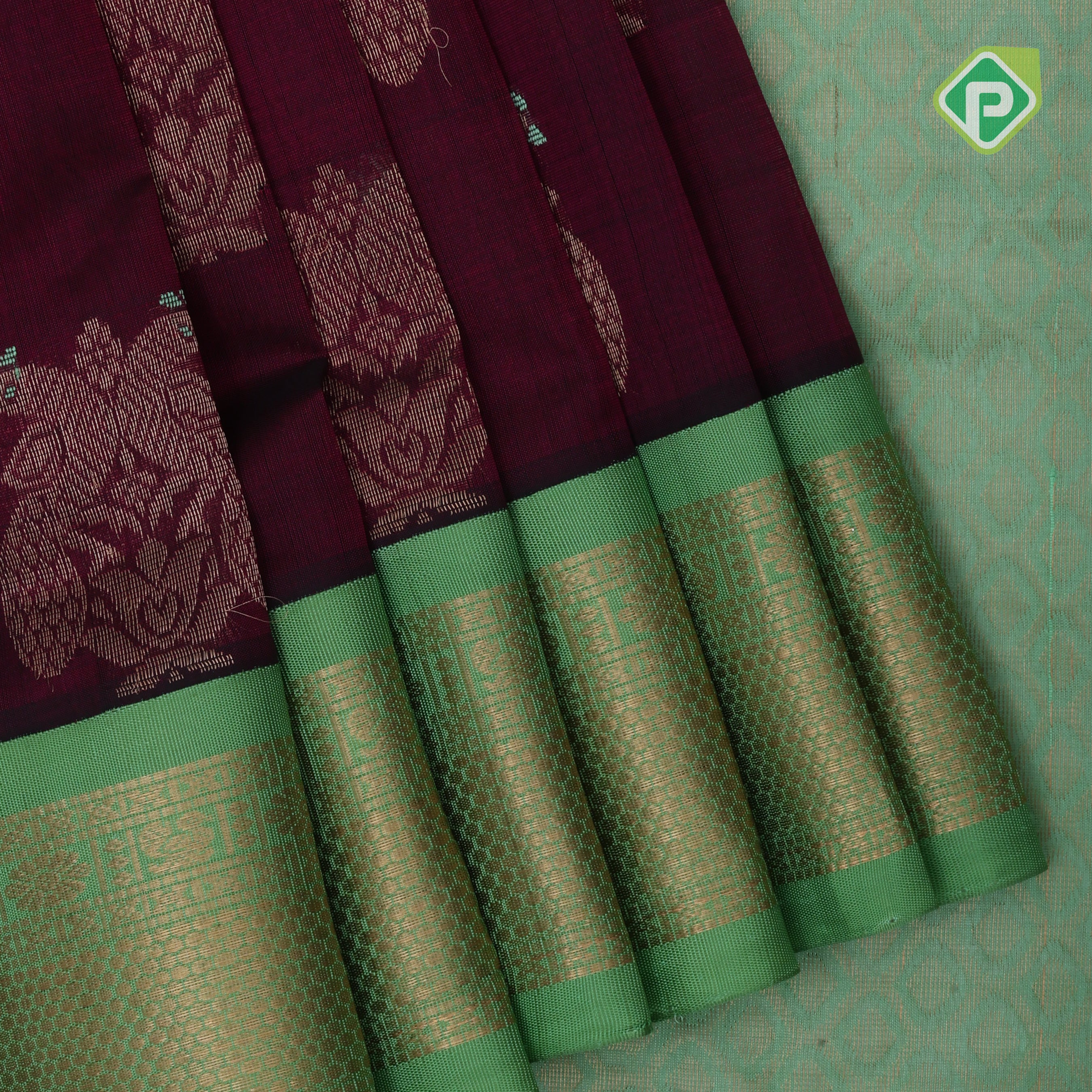 Dark pink multi color zari checks Contrast green gold zari border kuppadam silk saree