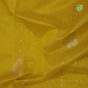 Mango yellow silver gold zari lines mid flower butta contrast pink blue edge border kuppadam silk saree