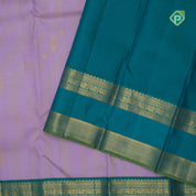 Lavender silk thread gold zari stripes mid flower butta design contrast green gold zari rettapet border Traditional silk saree