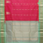 Hot Pink dull gold zari checks and butta lines contrast leaf green gold zari mailkan border silk cotton saree
