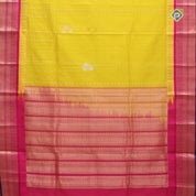 Mango yellow silver gold zari lines mid flower butta contrast pink blue edge border kuppadam silk saree