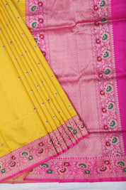 mango yellow gold zari meena work butta design contrast pink gold zari rangoli meena work border banaras silk saree