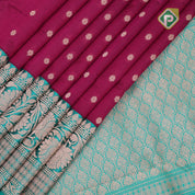Hot pink gold zari small flower butta design contrast green gold zari rangoli border banaras silk saree