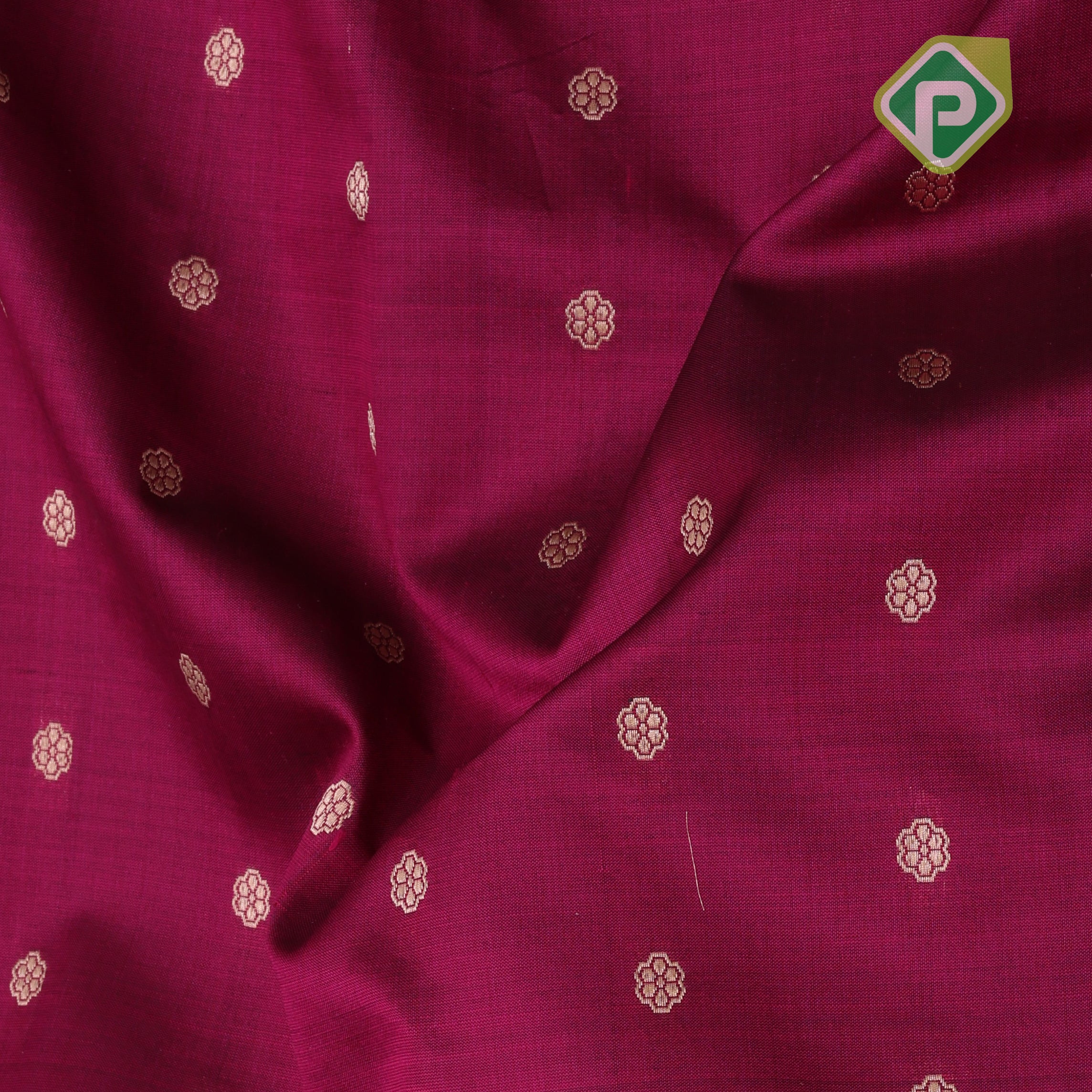 Hot pink gold zari small flower butta design contrast green gold zari rangoli border banaras silk saree