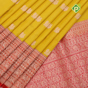 mango yellow gold zari peacock butta design contrast red gold zari rangoli design lines border banaras silk saree