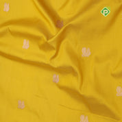 mango yellow gold zari peacock butta design contrast red gold zari rangoli design lines border banaras silk saree