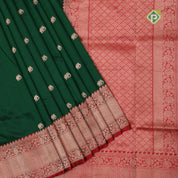 Forest green gold zari elephant butta contrast red rangoli mid mayilkan border banaras saree
