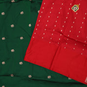 Forest green gold zari elephant butta contrast red rangoli mid mayilkan border banaras saree