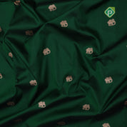 Forest green gold zari elephant butta contrast red rangoli mid mayilkan border banaras saree