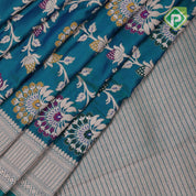 peacock blue silver gold zari grand floral design self gold zari rangoli design border Banaras silk saree