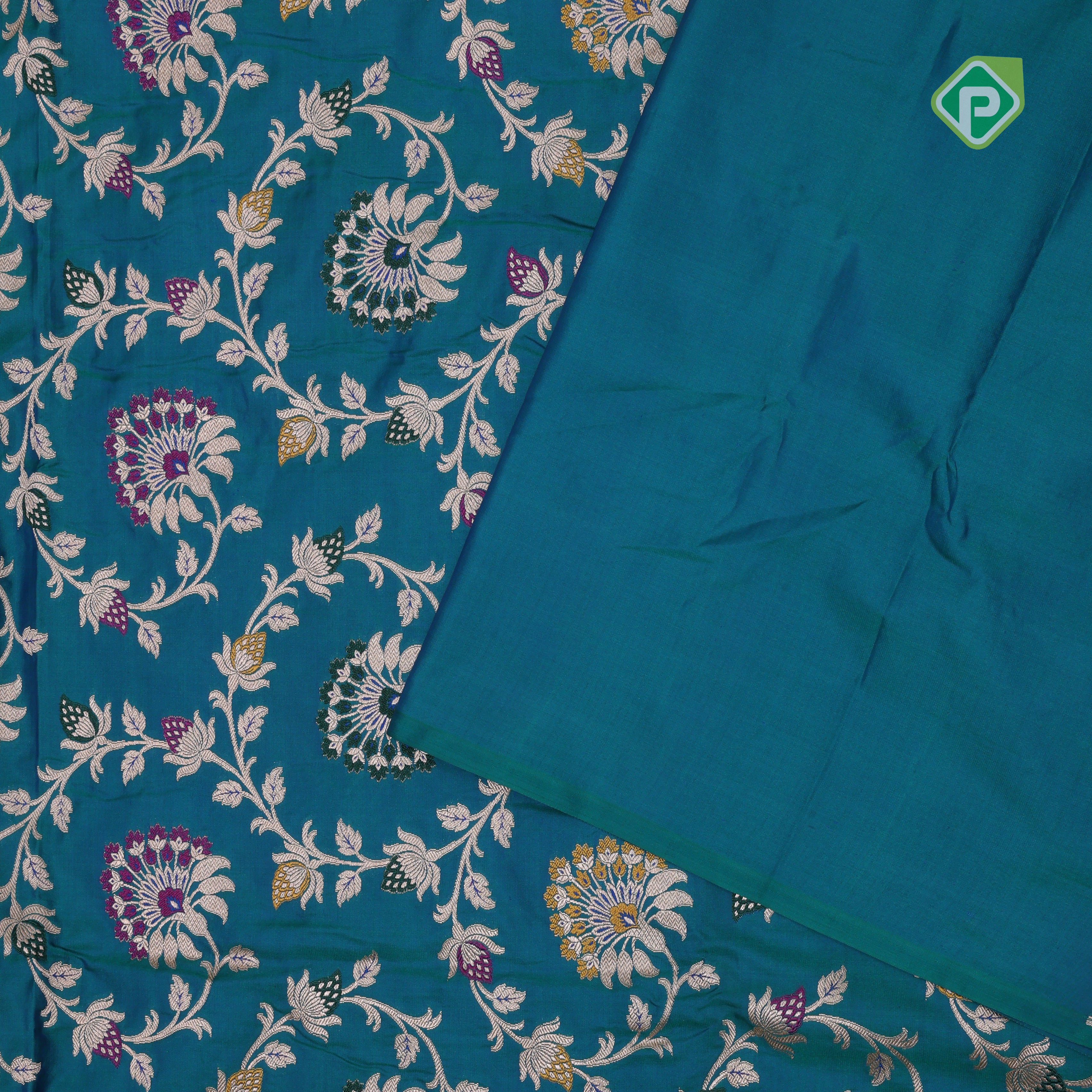 peacock blue silver gold zari grand floral design self gold zari rangoli design border Banaras silk saree