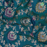 peacock blue silver gold zari grand floral design self gold zari rangoli design border Banaras silk saree