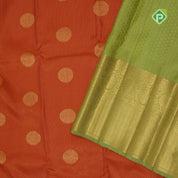 Honey orange gold zari big chakkaram butta contrast leaf green gold zari rangoli border Traditional silk saree
