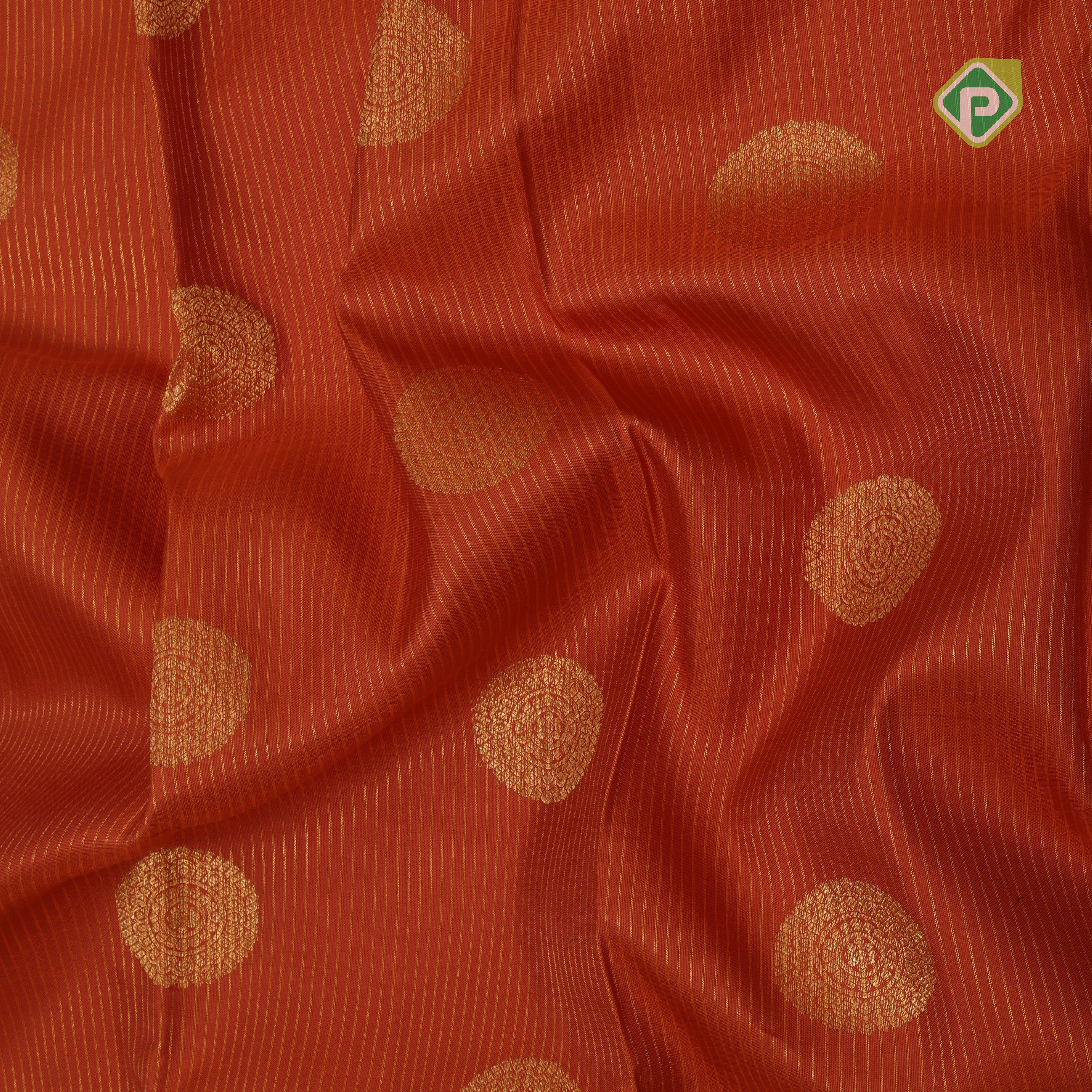 Honey orange gold zari big chakkaram butta contrast leaf green gold zari rangoli border Traditional silk saree