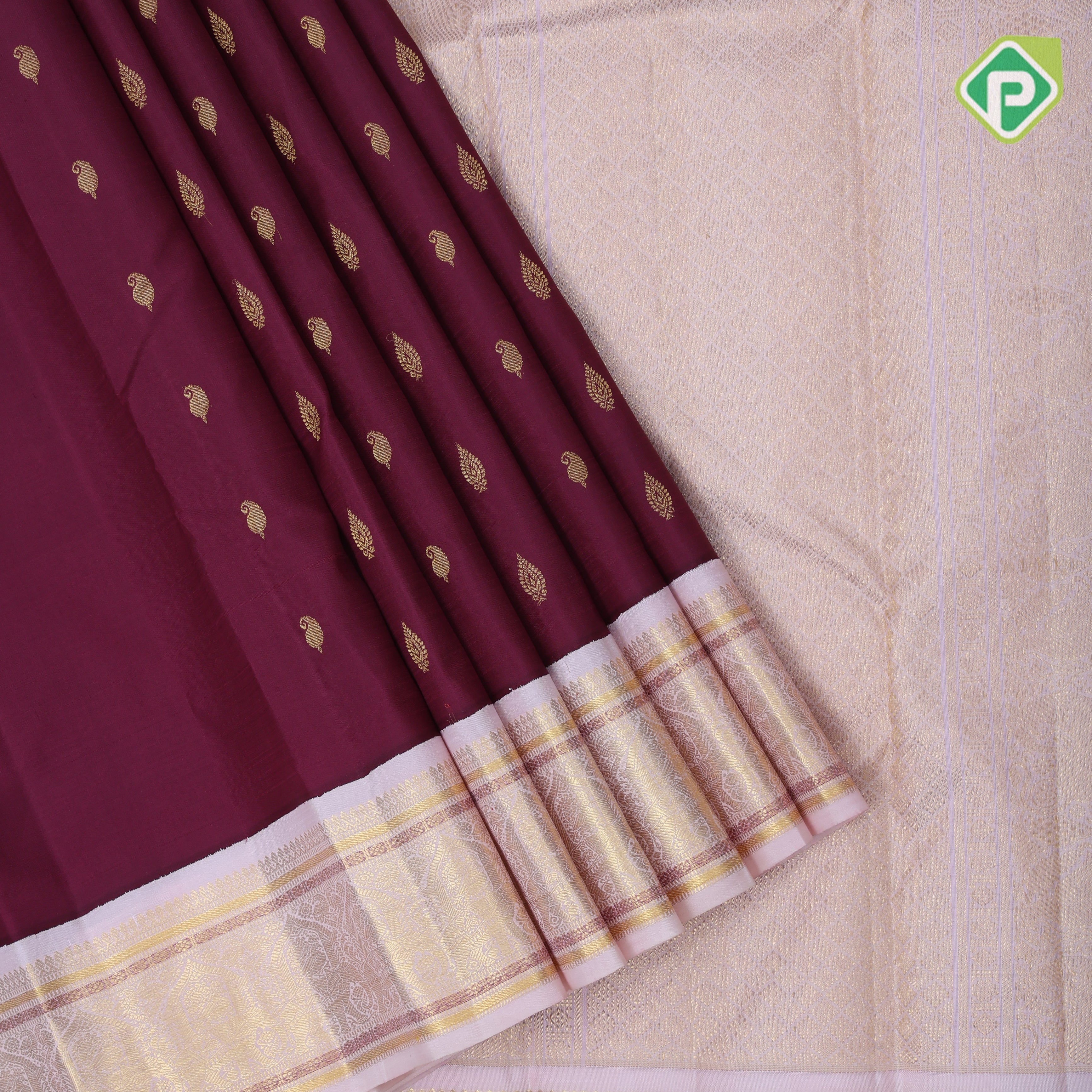 Beetroot pink gold zari mango thilagam butta contrast peach cream ambari design border Traditional silk saree