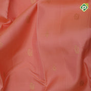 Peach gold zari peacock and flower butta design contrast blue gold zari peacock chakram border Traditional silk saree
