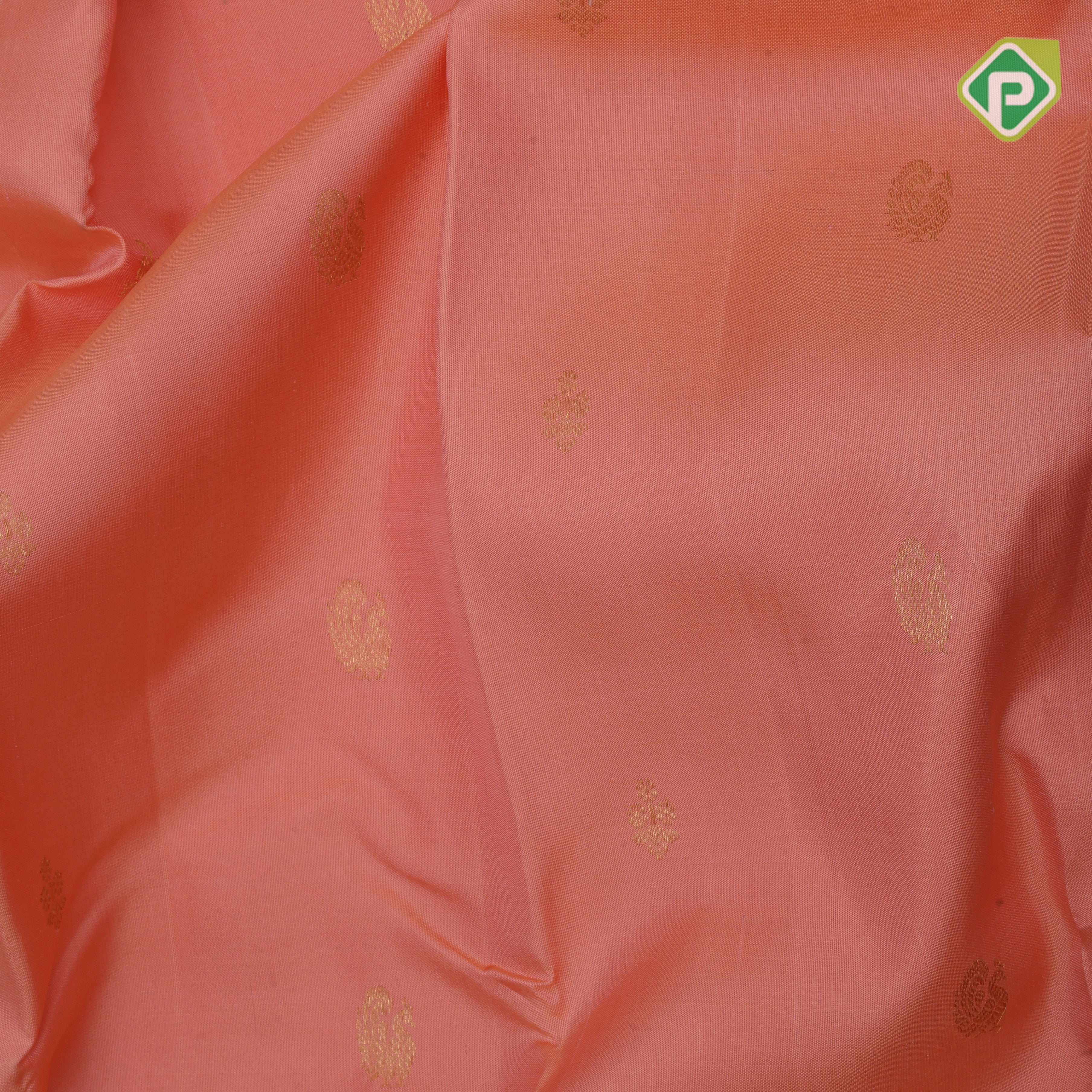 Peach gold zari peacock and flower butta design contrast blue gold zari peacock chakram border Traditional silk saree