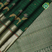 Dark green dual shade lines gold zari leaf meena work butta self gold zari red edge border signature traditional silk saree