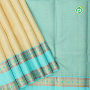 creamy sandal gold zari small round butta contrast sea blue rettapet border traditional silk saree