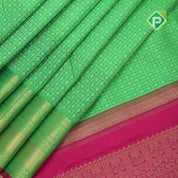 Leaf green full thread work flower checked self gold zari Arch pink edge border bridal silk saree