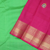 Leaf green full thread work flower checked self gold zari Arch pink edge border bridal silk saree