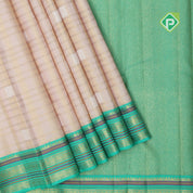 Peach pink silver gold zari designed checks design contrast rexona green zari thread lines border bridal silk saree