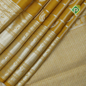 Lemon yellow silver zari checked window mid butta self zari peacock lines border traditional silk saree