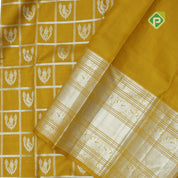 Lemon yellow silver zari checked window mid butta self zari peacock lines border traditional silk saree
