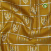 Lemon yellow silver zari checked window mid butta self zari peacock lines border traditional silk saree