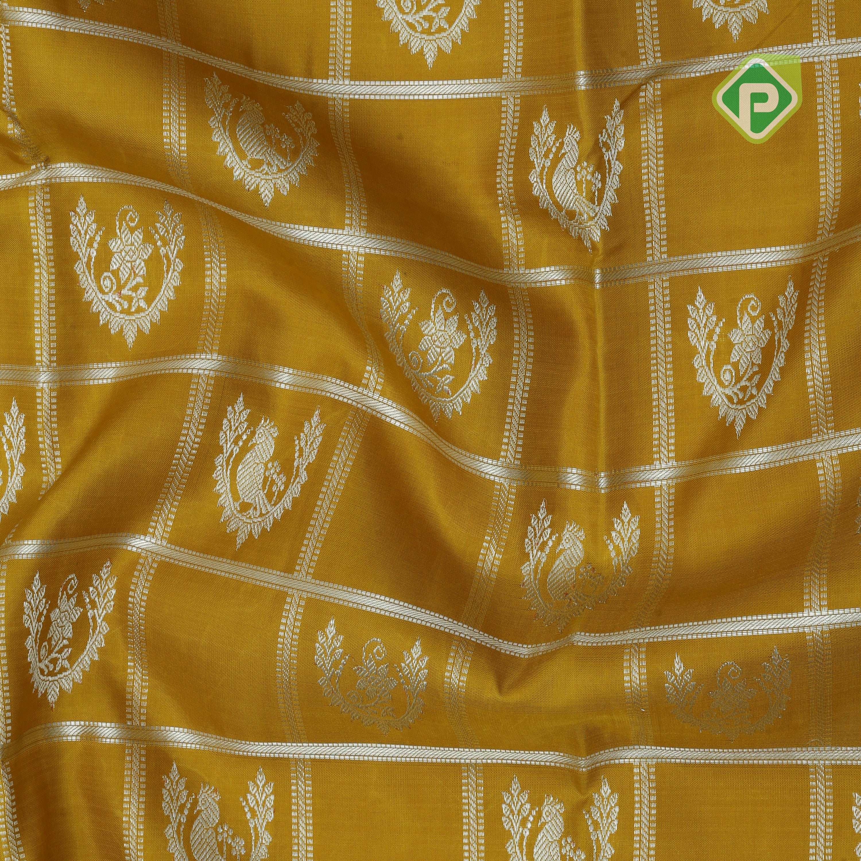 Lemon yellow silver zari checked window mid butta self zari peacock lines border traditional silk saree