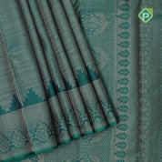 Emarald green gold zari small butta lines self gold zari zig zag border all over weaved silk saree