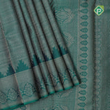 Emarald green gold zari small butta lines self gold zari zig zag border all over weaved silk saree