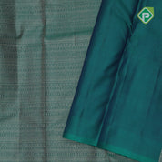 Emarald green gold zari small butta lines self gold zari zig zag border all over weaved silk saree