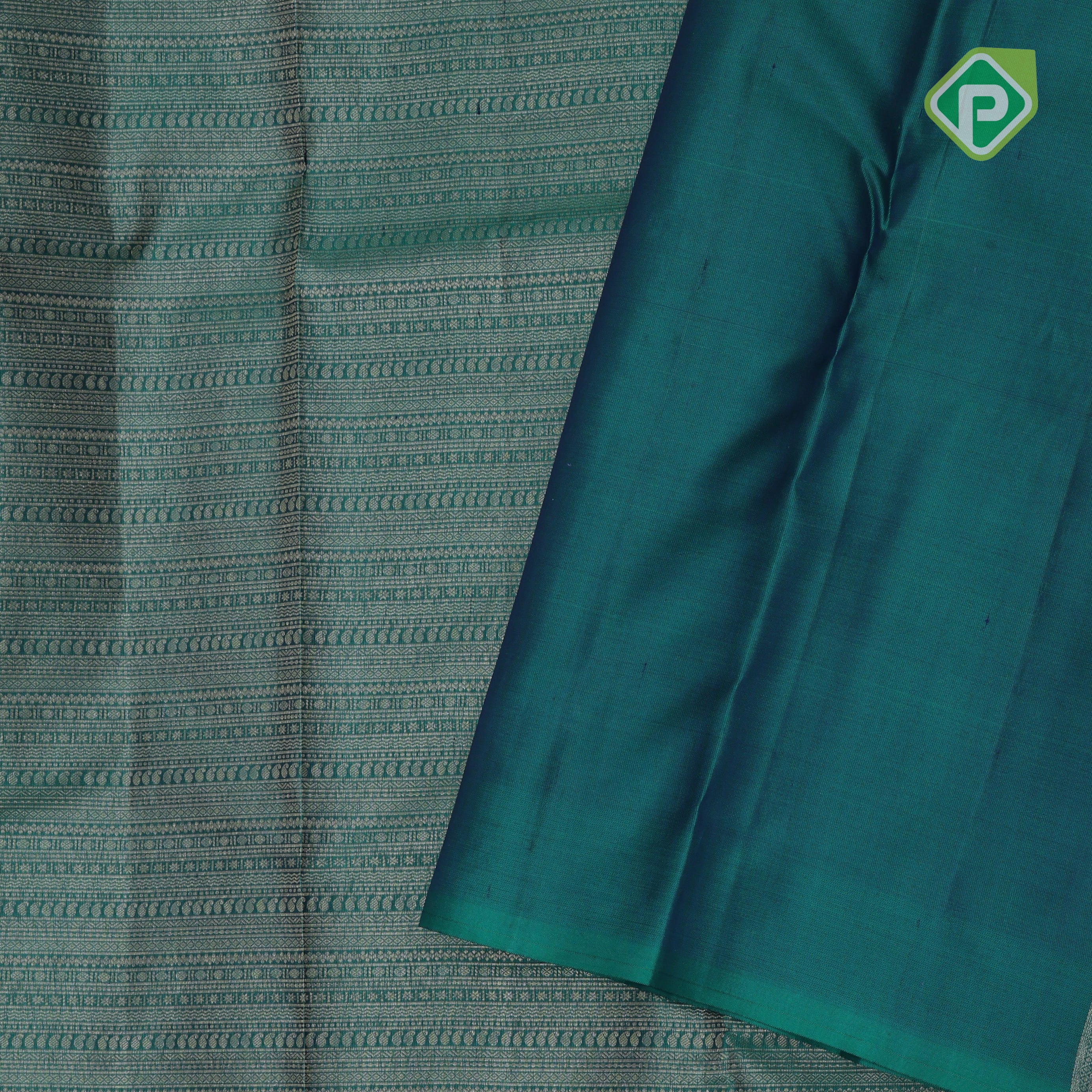 Emarald green gold zari small butta lines self gold zari zig zag border all over weaved silk saree