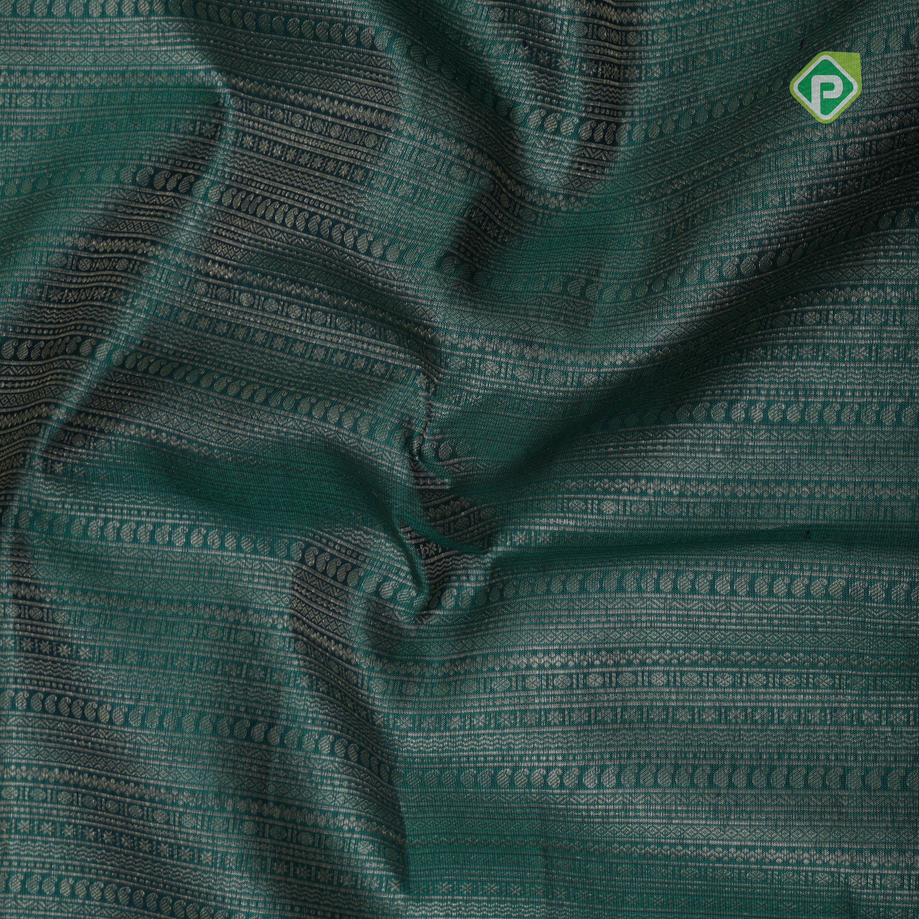 Emarald green gold zari small butta lines self gold zari zig zag border all over weaved silk saree