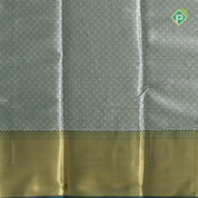 goldish self grand floral tissue contrast green border celebrity fame trendy fancy saree