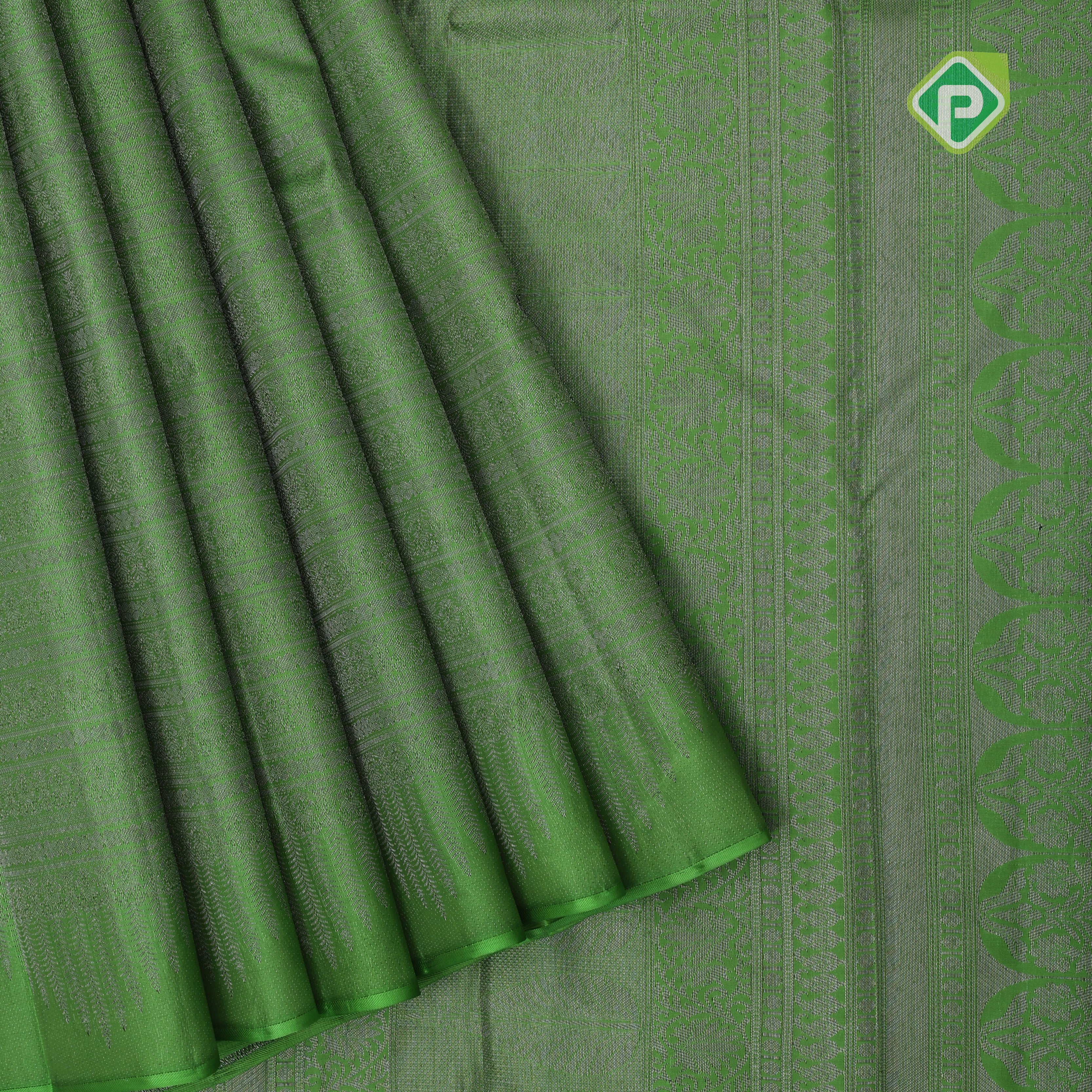 Emarald green gold zari small butta lines self gold zari zig zag border all over weaved silk saree