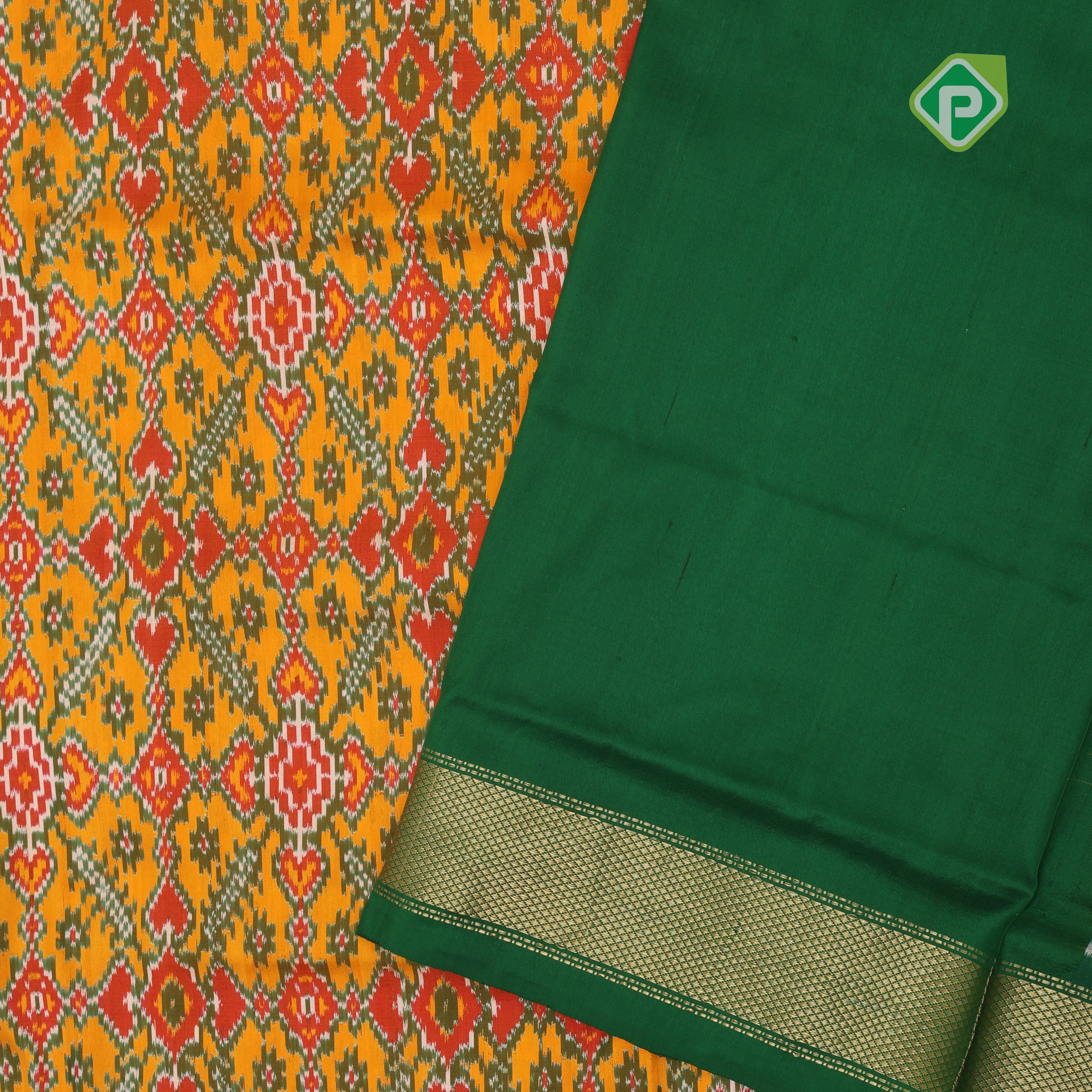 yellow base multi color ikkat design contrast green gold zari diamond border ikkat silk saree